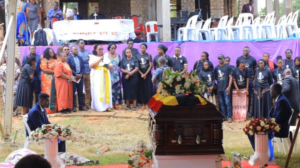 Dr. Justine Walusimbi Vows To Carry On Dr. Spire Kiggundu’s Legacy During his Burial